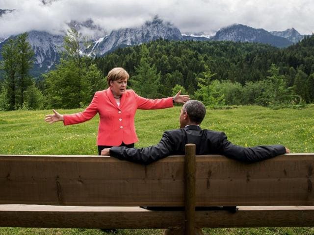 German chancellor Angela Merkel speaks with US President Barack Obama at Schloss Elmau hotel near Garmisch-Partenkirchen, southern Germany(AP File Photo)