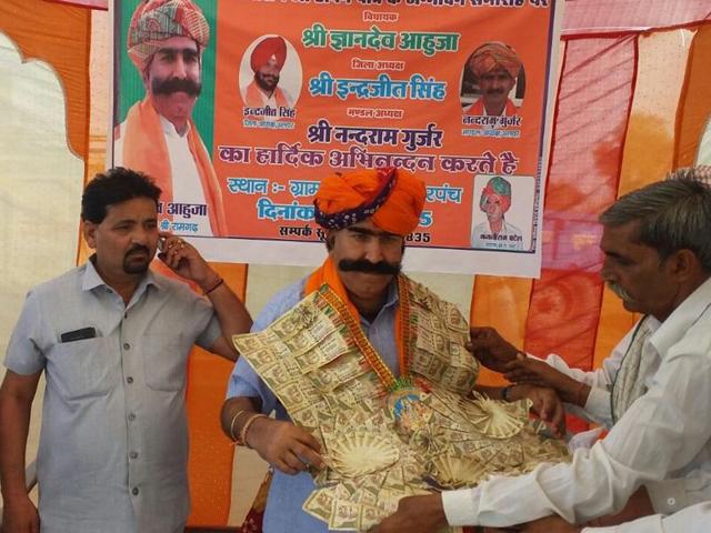 Gyan Dev Ahuja, BJP MLA from Ramgarh in Rajasthan, at a function in a village of his constituency in September 2015. Gyan Dev Ahuja, BJP MLA from Ramgarh in Rajasthan, at a function in a village of his constituency in September 2015.