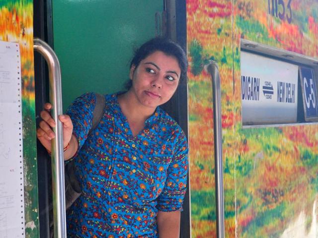 A passenger aboard the Shatabdi Express to Delhi at the Chandigarh railway station on Wednesday.(Photo: Karun Sharma/HT)