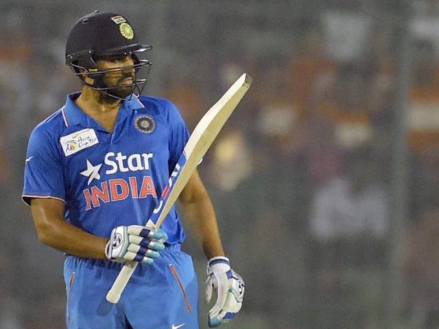 Rohit Sharma acknowledges the crowd after scoring a half century. (AFP Photo) Rohit Sharma acknowledges the crowd after scoring a half century. (AFP Photo)