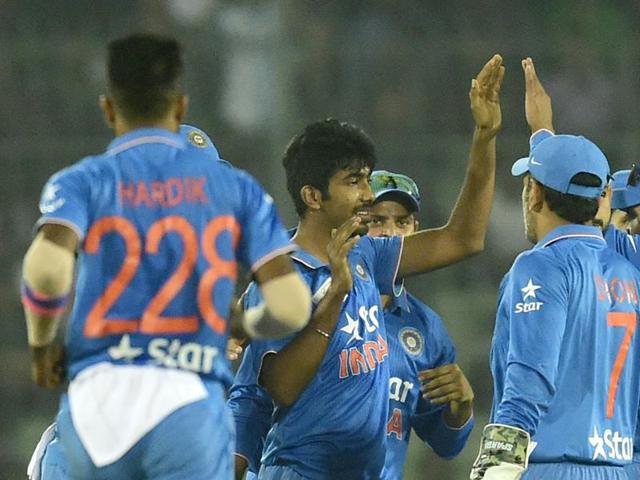 India’s Jasprit Bumrah (C) celebrates with teammates after the dismissal of Bangladesh batsman Soumya Sarkar during the Asia Cup Twenty20 match between India and Bangladesh at The Sher-e-Bangla National Cricket Stadium in Dhaka on February 24, 2016. (AFP Photo) India’s Jasprit Bumrah (C) celebrates with teammates after the dismissal of Bangladesh batsman Soumya Sarkar during the Asia Cup Twenty20 match between India and Bangladesh at The Sher-e-Bangla National Cricket Stadium in Dhaka on February 24, 2016. (AFP Photo)
