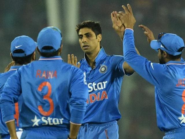 Ashish Nehra celebrates with teammates after the dismissal of Bangladesh batsman Mohammad Mithun.(AFP Photo)