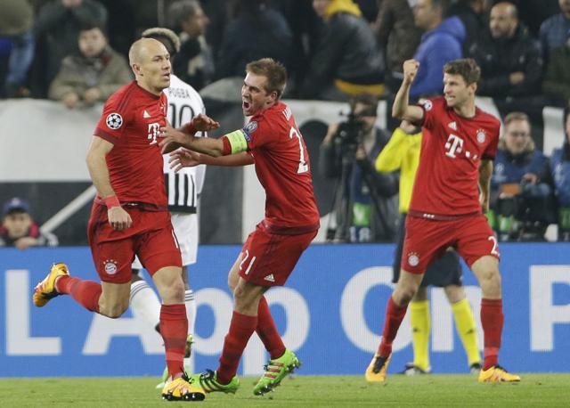 Bayern's Arjen Robben, left, is congratulated by his teammate Philipp Lahm after scoring their side's second goal during the Champions League, round of 16, first-leg soccer match between Juventus and Bayern Munich at the Juventus stadium in Turin, Italy, Tuesday, Feb. 23, 2016. (AP Photo/Luca Bruno) (AP) Bayern's Arjen Robben, left, is congratulated by his teammate Philipp Lahm after scoring their side's second goal during the Champions League, round of 16, first-leg soccer match between Juventus and Bayern Munich at the Juventus stadium in Turin, Italy, Tuesday, Feb. 23, 2016. (AP Photo/Luca Bruno) (AP)