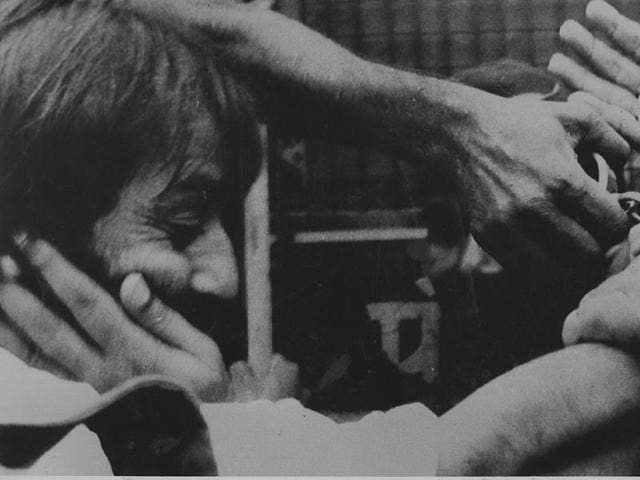 Hands stretch out towards Sanjay Dutt as he was taken away from the court to prison in 1994. the actor was released Thursday after serving the term. (HT Photo) Hands stretch out towards Sanjay Dutt as he was taken away from the court to prison in 1994. the actor was released Thursday after serving the term. (HT Photo)