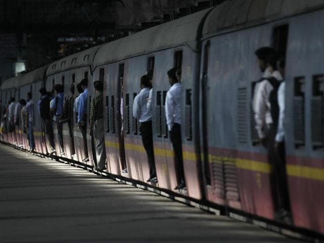 The long wait:  Commuters aboard a local train at Chatrapati Shivaji Terminus.  (Vijayanand Gupta/HT Photo) 