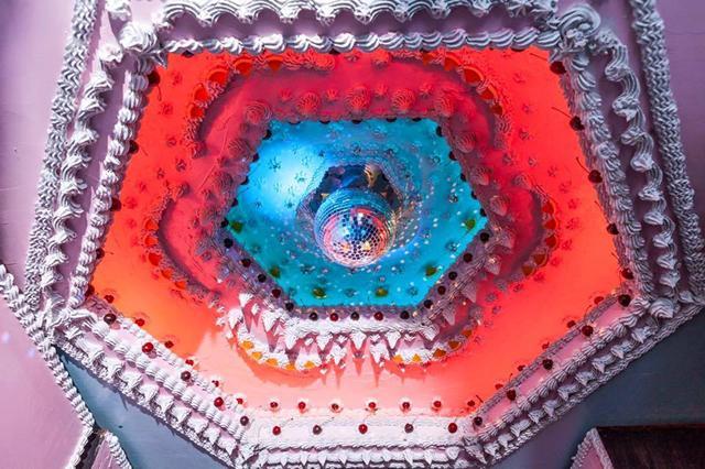 Visitors can make their way through the labyrinth of fake cream and fruit to a secret 1950s-style diner serving food from local chefs. (Twitter)