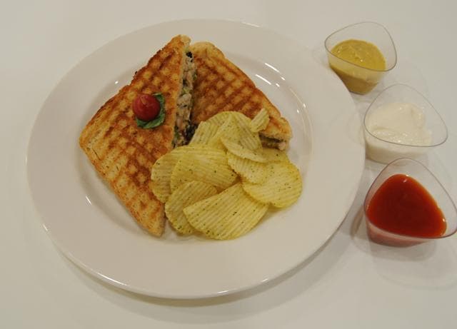 Chicken sandwiches, made of fresh white bread, peppered, boiled shredded chicken in gooey sweet mayonnaise, and a dash of some English mustard between the slices (Hindustan Times) Chicken sandwiches, made of fresh white bread, peppered, boiled shredded chicken in gooey sweet mayonnaise, and a dash of some English mustard between the slices (Hindustan Times)
