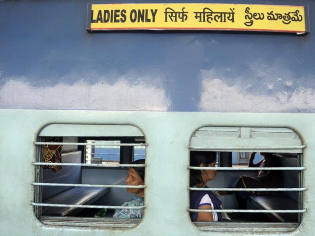 Passengers sit in a 'Ladies Only 'carriage as they wait for a train to depart from a platform at Secunderabad railway station, in Hyderabad. Railways minister Suresh Prabhu announced on Thursday that middle bays in coaches will be reserved for women. (AFP Photo) 