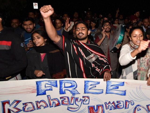 JNU students holding placards in support of arrested student leaders at the JNU campus on Wednesday. (Hindustan Times) JNU students holding placards in support of arrested student leaders at the JNU campus on Wednesday. (Hindustan Times)