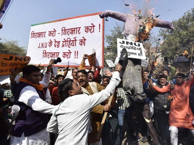 VHP, Bajrang Dal and All Nationalists students union protest against JNU. Attempting to try and instil patriotism in our students via military symbols is a dangerous path. (HT Photo) VHP, Bajrang Dal and All Nationalists students union protest against JNU. Attempting to try and instil patriotism in our students via military symbols is a dangerous path. (HT Photo)