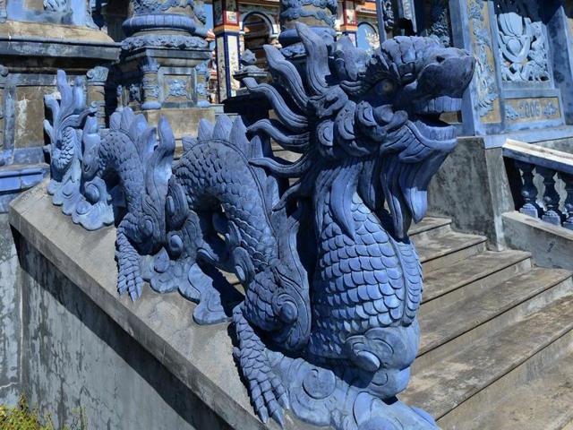 Locals in An Bang have let their creativity run riot when it comes to tombs. While traditional Vietnamese dragon carvings are popular, some graves also appear to draw inspiration from Hindu imagery, with others featuring Christian or Islamic symbols.  (AFP) 