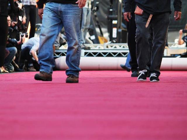 The carpet may look pink right now but it is really red. (Facebook) 