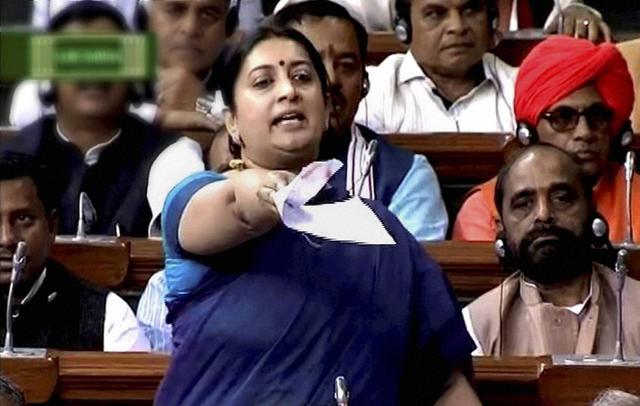 Smriti Irani speaks in the Lok Sabha in New Delhi on Wednesday. (PTI)