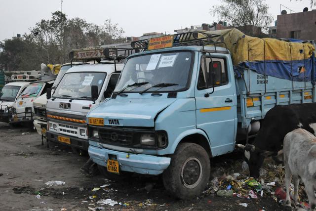 Vehicles Parked along the road at Khanpur Extension on MB Road. (S Burmaula/HT Photo)