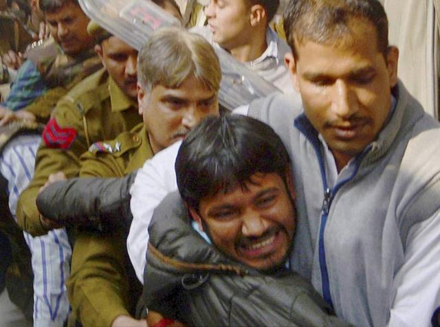 A lawyer (C), who spoke to the media supporting JNU student leader Kanhaiya Kumar, is beaten up by other lawyers outside Patiala House courts in New Delhi. (PTI Photo) A lawyer (C), who spoke to the media supporting JNU student leader Kanhaiya Kumar, is beaten up by other lawyers outside Patiala House courts in New Delhi. (PTI Photo)
