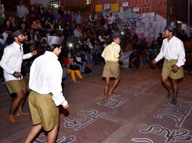 JNU students protest demanding the release of Kanhaiya Kumar, Umar Khalid and others arrested on sedition charges at the university campus in New Delhi. (PTI Photo)