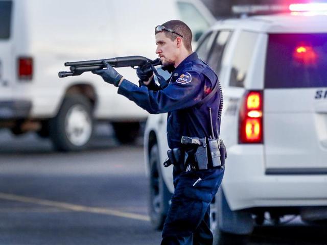 Police guard the front door of Excel Industries in Hesston, Kansas, where a gunman killed at least 4 people and injured many more. (AP Photo) Police guard the front door of Excel Industries in Hesston, Kansas, where a gunman killed at least 4 people and injured many more. (AP Photo)