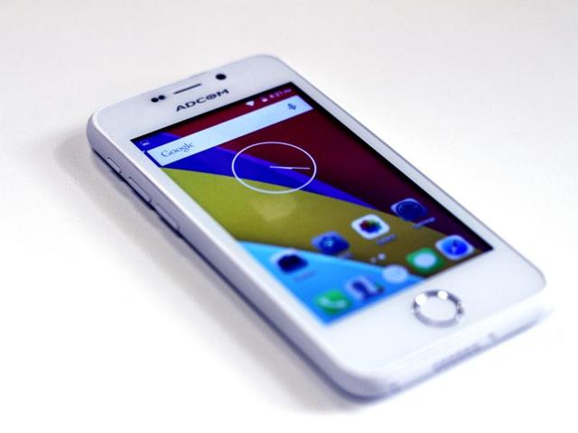 Real or dummy? The sample phone looked like a copy of an Apple iphone with the brand name ‘Adcom’ camouflaged with white paint. (Photo by Sanchit Khanna)(Hindustan Times) Real or dummy? The sample phone looked like a copy of an Apple iphone with the brand name ‘Adcom’ camouflaged with white paint. (Photo by Sanchit Khanna)(Hindustan Times)