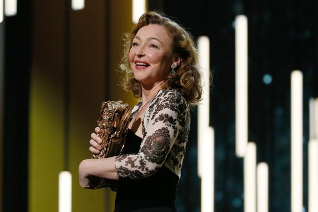 French actor Catherine Frot smiles after she won the Best Actress award for Marguerite during the 41st edition of the Cesar Ceremony in Paris. (AFP)