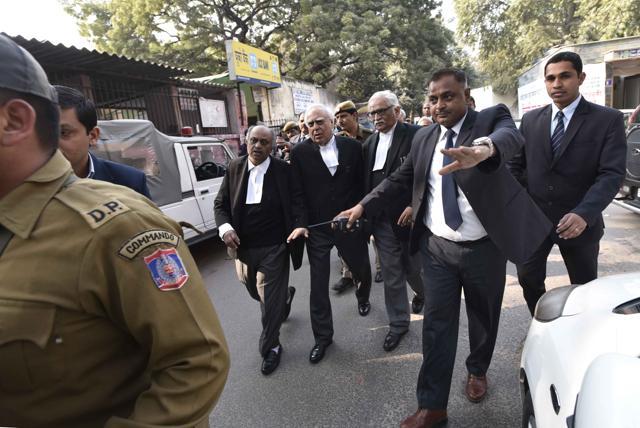 A team of lawyers headed by Kapil Sibal enter the premises of Patiala House. (Arun Sharma/Hindustan Times)
