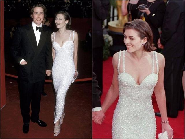 In 1995, a year after wearing THAT safety-pinned Versace dress to the premiere of Four Weddings And A Funeral, Liz Hurley stepped out once again on the arm of Hugh Grant. This time she was wearing a slightly less out-there affair, a beautiful embellished gown (with the requisite plunging neckline still in place of course). (Pinterest)
