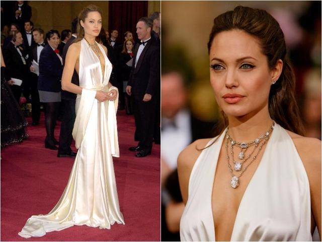 Angelina Jolie was hotter than ever in this plunging white silk Marc Bouwer gown in 2004. (Pinterest)