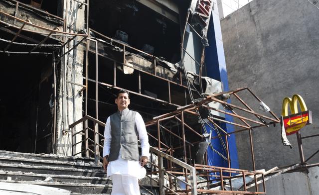 Suresh Kumar Sharma outside his burnt-down mall at Rohtak town. His RN Engineering College was also vandalised. (Sanjeev Sharma/HT) Suresh Kumar Sharma outside his burnt-down mall at Rohtak town. His RN Engineering College was also vandalised. (Sanjeev Sharma/HT)