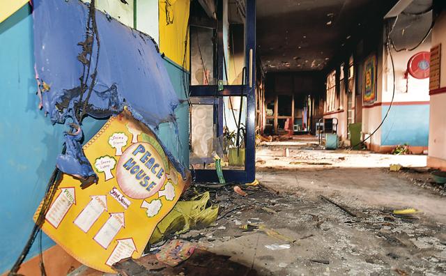 The challenge for John Wesley School is to erase the trail of destruction left by the mob attack. (Sanjeev Sharma/HT) The challenge for John Wesley School is to erase the trail of destruction left by the mob attack. (Sanjeev Sharma/HT)
