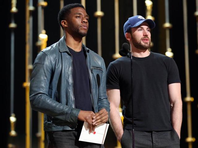 Chadwick Boseman, left, and Chris Evans. Other stars rehearsing Saturday included Emily Blunt, Kerry Washington, Ryan Gosling, Julianne Moore, Sofia Vergara, Eddie Redmayne, John Legend, Common, Benicio del Toro and Russell Crowe. (Matt Sayles/Invision/AP) Chadwick Boseman, left, and Chris Evans. Other stars rehearsing Saturday included Emily Blunt, Kerry Washington, Ryan Gosling, Julianne Moore, Sofia Vergara, Eddie Redmayne, John Legend, Common, Benicio del Toro and Russell Crowe. (Matt Sayles/Invision/AP)