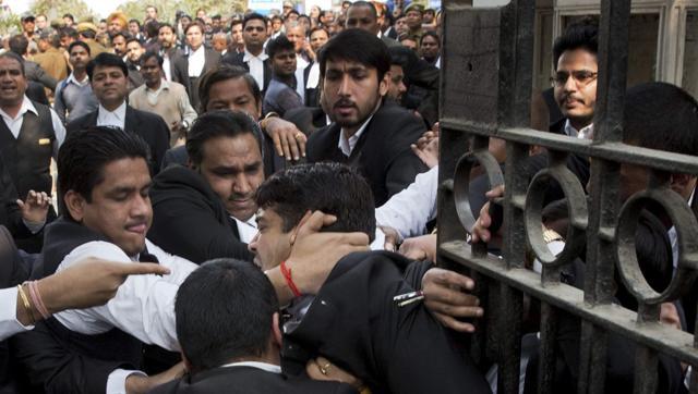 Lawyers assault a journalist outside Patiala House Court in New Delhi on Feb 17. The SC has expressed concern over the standard of lawyers and the Bar Council recently said a third of lawyers may be fake. (PTI Photo) Lawyers assault a journalist outside Patiala House Court in New Delhi on Feb 17. The SC has expressed concern over the standard of lawyers and the Bar Council recently said a third of lawyers may be fake. (PTI Photo)