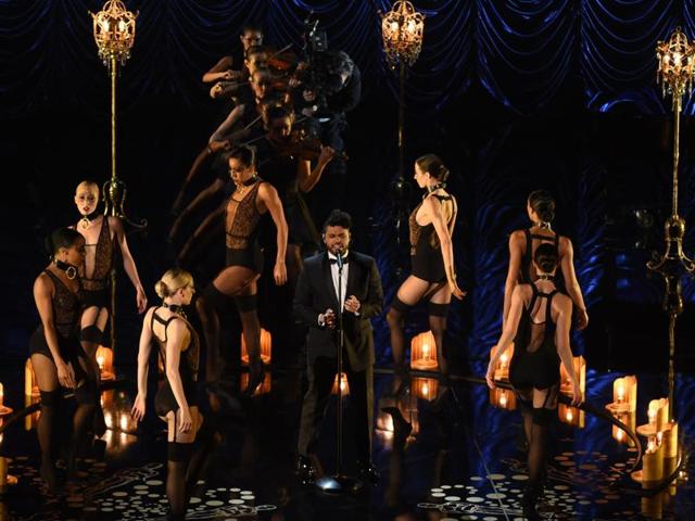 Singer The Weeknd performs on stage at the 88th Oscars. He was nominated in the Best Original Song category for the film Fifty Shades of Grey. (AFP) Singer The Weeknd performs on stage at the 88th Oscars. He was nominated in the Best Original Song category for the film Fifty Shades of Grey. (AFP)