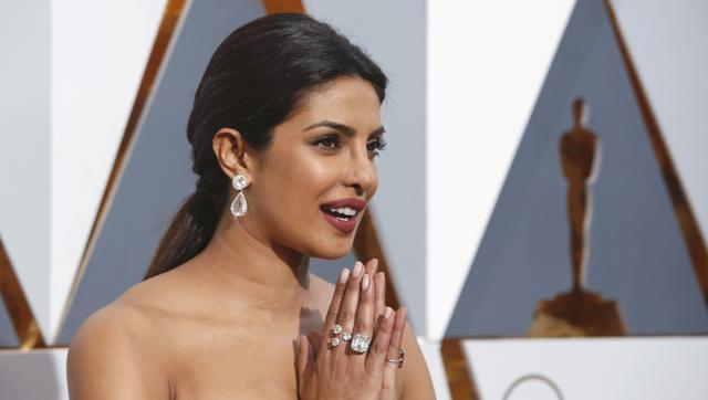 The former Miss World might have drawn the eye with her transparent lace white gown, but the real glitz and glamour was hanging from her ears and fingers - costing a total of just under $8 million. (REUTERS) The former Miss World might have drawn the eye with her transparent lace white gown, but the real glitz and glamour was hanging from her ears and fingers - costing a total of just under $8 million. (REUTERS)