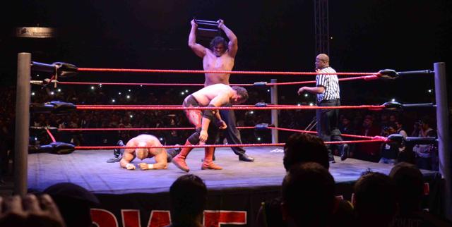 After taking them on outside the ring, Khali brought the action back inside. (HT Photo)