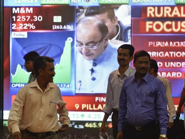 Office-goers walk past a digital screen showing finance minister Arun Jaitley delivering his Budget speech at Parliament in New Delhi on February 29, 2016. (Kunal Patil/HT Photo) Office-goers walk past a digital screen showing finance minister Arun Jaitley delivering his Budget speech at Parliament in New Delhi on February 29, 2016. (Kunal Patil/HT Photo)