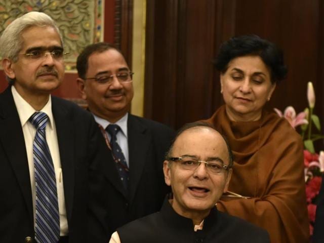 Arun Jaitley with his colleagues during photo session while giving final touches to the Union Budget at Finance Ministry North Block in New Delhi. (Arvind Yadav/ HT Photo) 