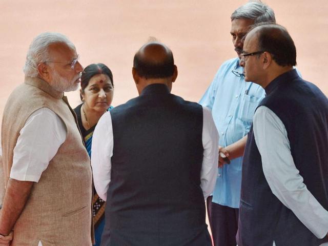 Prime Minister Narendra Modi with home minister Rajnath Singh, external affairs minister Sushma Swaraj, finance minister Arun Jaitley and defence minister Manohar Parrikar at the Rashtrapati Bhavan in New Delhi.(PTI)