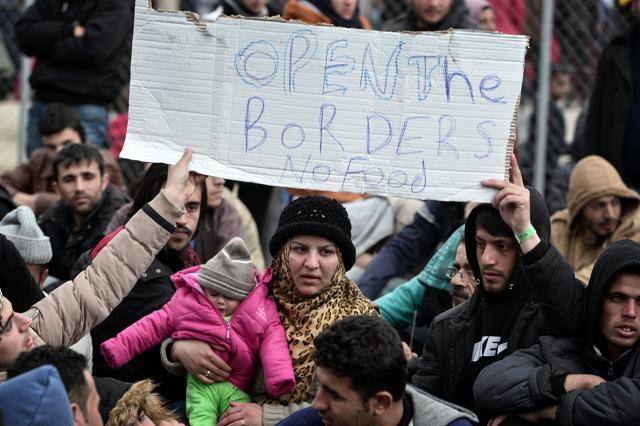 Refugees protest at rail tracks at the Greek-Macedonian borders near the village of Idomeni. (AFP)