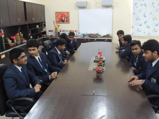 Class 12 students discussing among themselves at the Millennium school in Lucknow on Saturday. The CBSE board exams are scheduled to start on March 1. (Deepak Gupta/ HT photo)