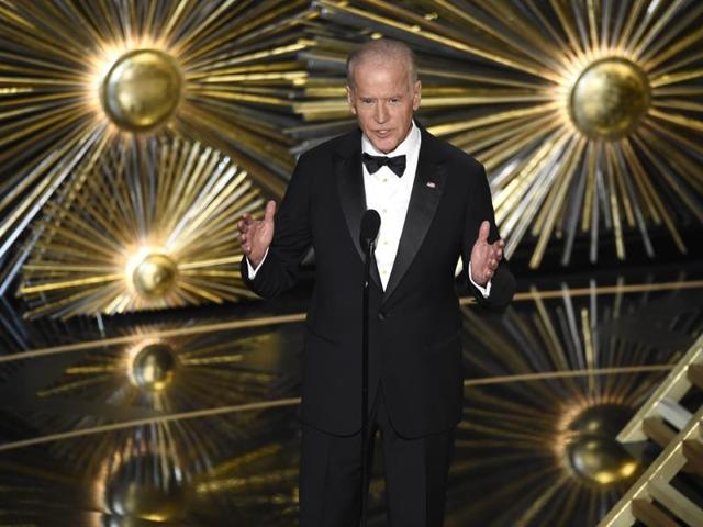 Vice President Joe Biden introduces a performance by Lady Gaga at the Oscars, drawing the first standing ovation of the day as he called for a change of culture. (AP) Vice President Joe Biden introduces a performance by Lady Gaga at the Oscars, drawing the first standing ovation of the day as he called for a change of culture. (AP)