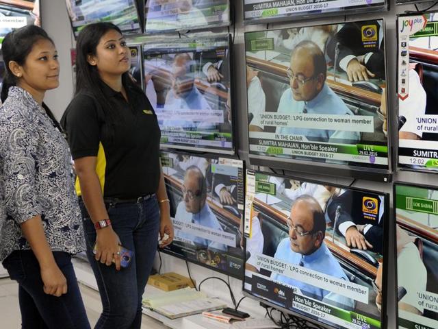 People watch Union Budget 2016-17 presentation by finance minister Arun Jaitely on TV sets at a showroom in Kolkata. (PTI) People watch Union Budget 2016-17 presentation by finance minister Arun Jaitely on TV sets at a showroom in Kolkata. (PTI)