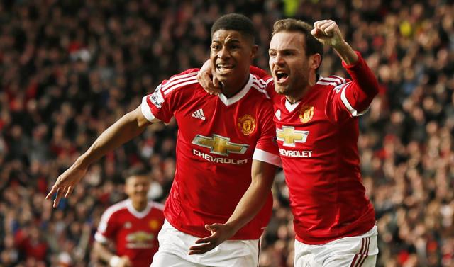 Manchester United's Marcus Rashford celebrates with Juan Mata. The academy player is one of seven who have made their debut this season for Van Gaal’s side. (REUTERS) Manchester United's Marcus Rashford celebrates with Juan Mata. The academy player is one of seven who have made their debut this season for Van Gaal’s side. (REUTERS)