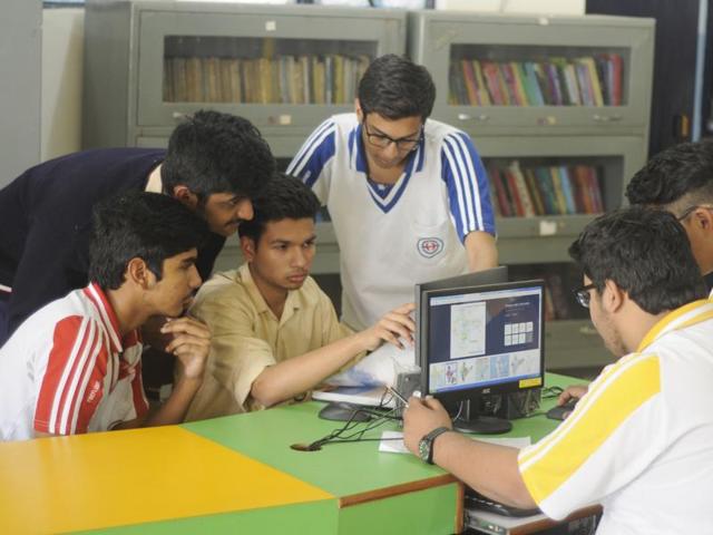 Class 12 students preparing for the exam in the library at the Study Hall School in Lucknow on Saturday. (Deepak Gupta/ HT photo)