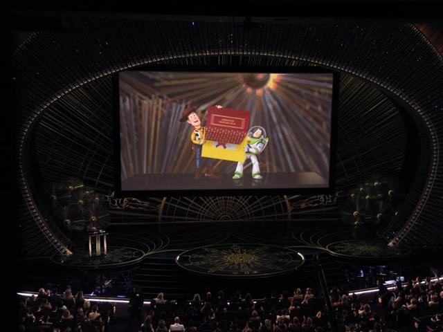 Woody and Buzz Lightyear from Toy Story appear on screen presenting the award for best animated feature film at the Oscars. The Pixar film Inside Out bagged the award. (AP) Woody and Buzz Lightyear from Toy Story appear on screen presenting the award for best animated feature film at the Oscars. The Pixar film Inside Out bagged the award. (AP)
