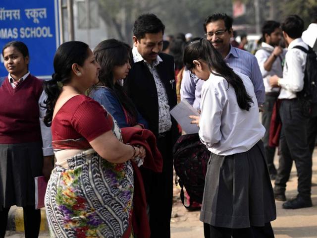 Students at the exam centre before appearing in CBSE Class 12 exam at St .Thomas’ School, Gole Market in New Delhi on Tuesday. (Arun Sharma / HT photo) Students at the exam centre before appearing in CBSE Class 12 exam at St .Thomas’ School, Gole Market in New Delhi on Tuesday. (Arun Sharma / HT photo)