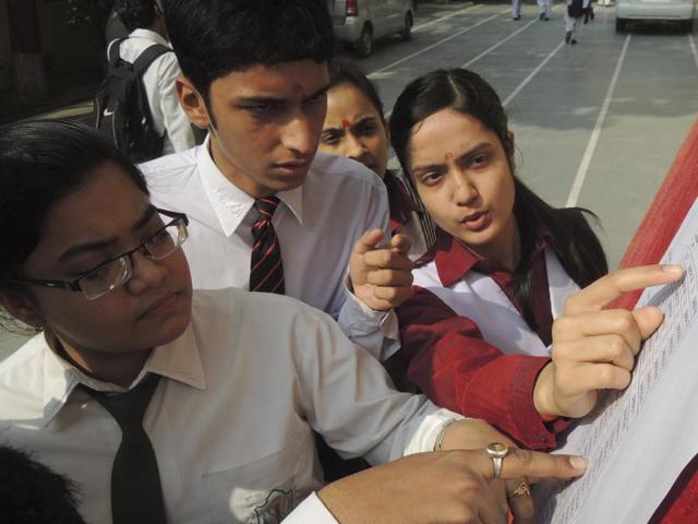 Students check their role numbers at an examination centre for the CBSE exams in Lucknow on Tuesday. The Boards, which begin today, will go on till April 22. (Deepak Gupta/HT photo) Students check their role numbers at an examination centre for the CBSE exams in Lucknow on Tuesday. The Boards, which begin today, will go on till April 22. (Deepak Gupta/HT photo)