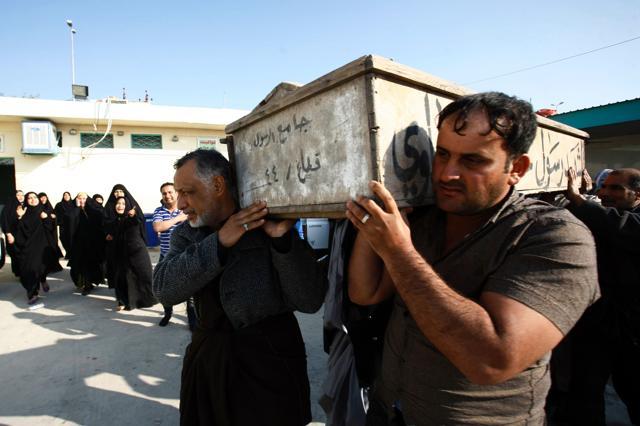 Iraqi mourners carry a coffin during the funeral of victims of bombings the previous day in Baghdad's mostly Shia Sadr City district, in the city of Najaf. (AFP Photo) Iraqi mourners carry a coffin during the funeral of victims of bombings the previous day in Baghdad's mostly Shia Sadr City district, in the city of Najaf. (AFP Photo)