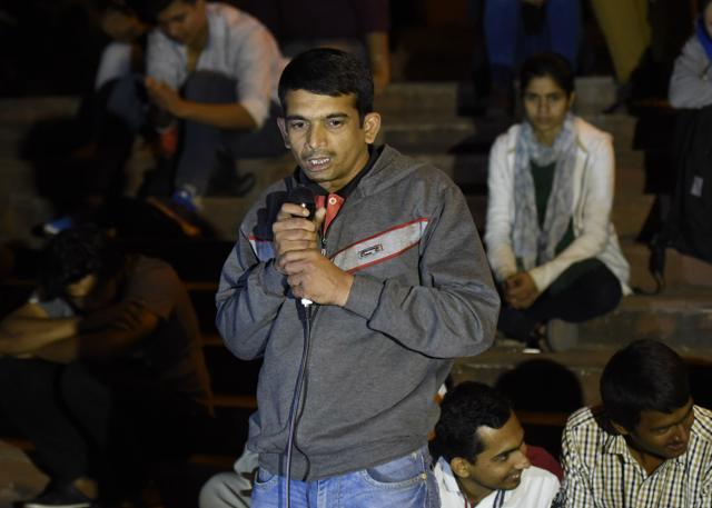 Kanhaiya Kumar's brother, Manikant talks to JNU students at the JNU campus in New Delhi on Monday. (Sanjeev Verma/ HT Photo)