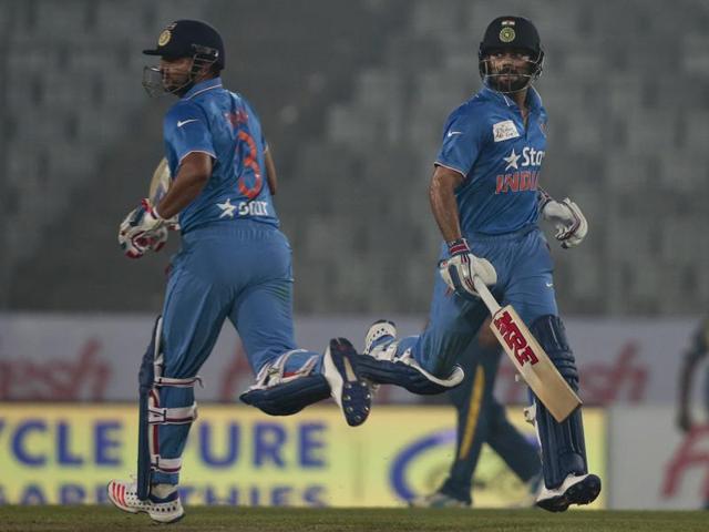 India’s Virat Kohli, right, and Suresh Raina run between the wickets. (AP Photo) 