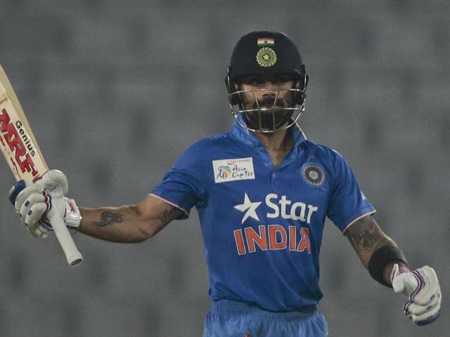 India’s Virat Kohli acknowledges the crowd after scoring fifty runs during the Asia Cup Twenty20 tournament. (AP Photo) India’s Virat Kohli acknowledges the crowd after scoring fifty runs during the Asia Cup Twenty20 tournament. (AP Photo)