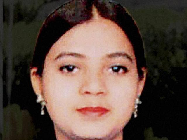A file photo of demonstrators holding a candlelight vigil for Ishrat Jahan. A file photo of demonstrators holding a candlelight vigil for Ishrat Jahan.